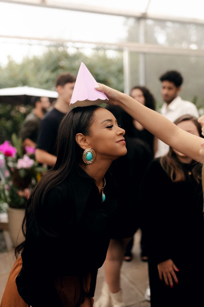 Guests sharing a candid moment during a birthday celebration